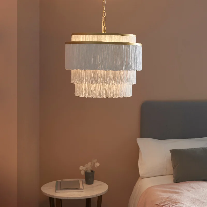 Chandeliers with Pendant Lights for a Stylish LookAmos Ruffle Chandelier Large Matt Gold with White Tassels Chandeliers with Pendant Lights for a Stylish LookAmos Ruffle Chandelier Large Matt Gold with White Tassels