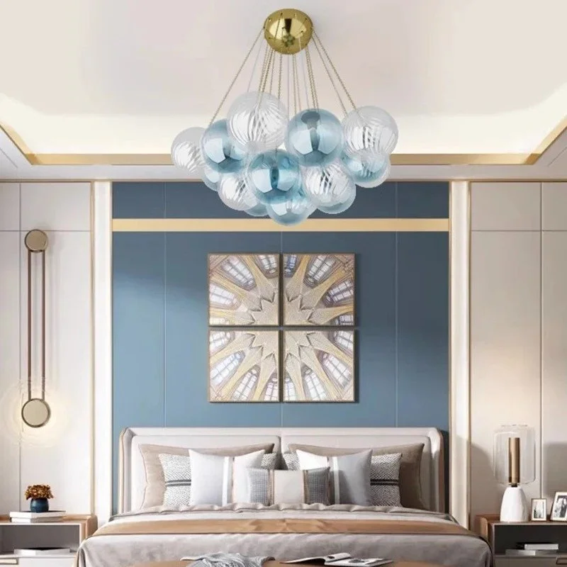 Victorian - Inspired Chandeliers with Ornate DetailsCuneiform Indoor Chandeliers