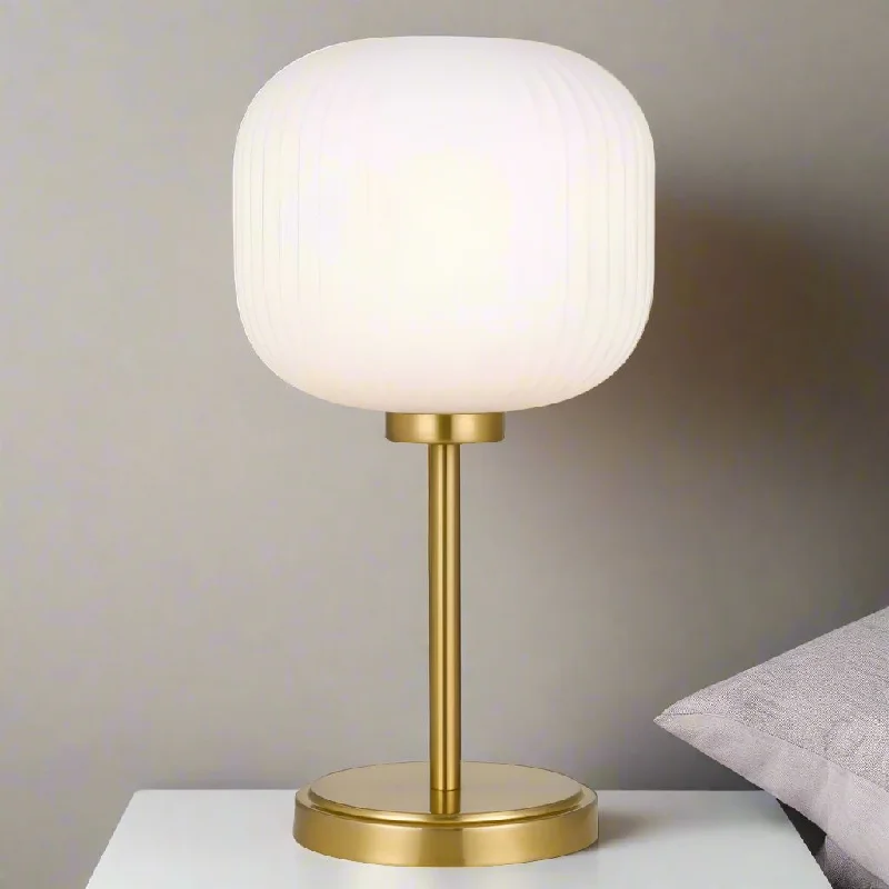 leather table lamps with a distressed texture for a rugged charmBobo Table Lamp Antique Gold/Opal BOBO TLA Telbix Lighting leather table lamps with a distressed texture for a rugged charmBobo Table Lamp Antique Gold/Opal BOBO TLA Telbix Lighting